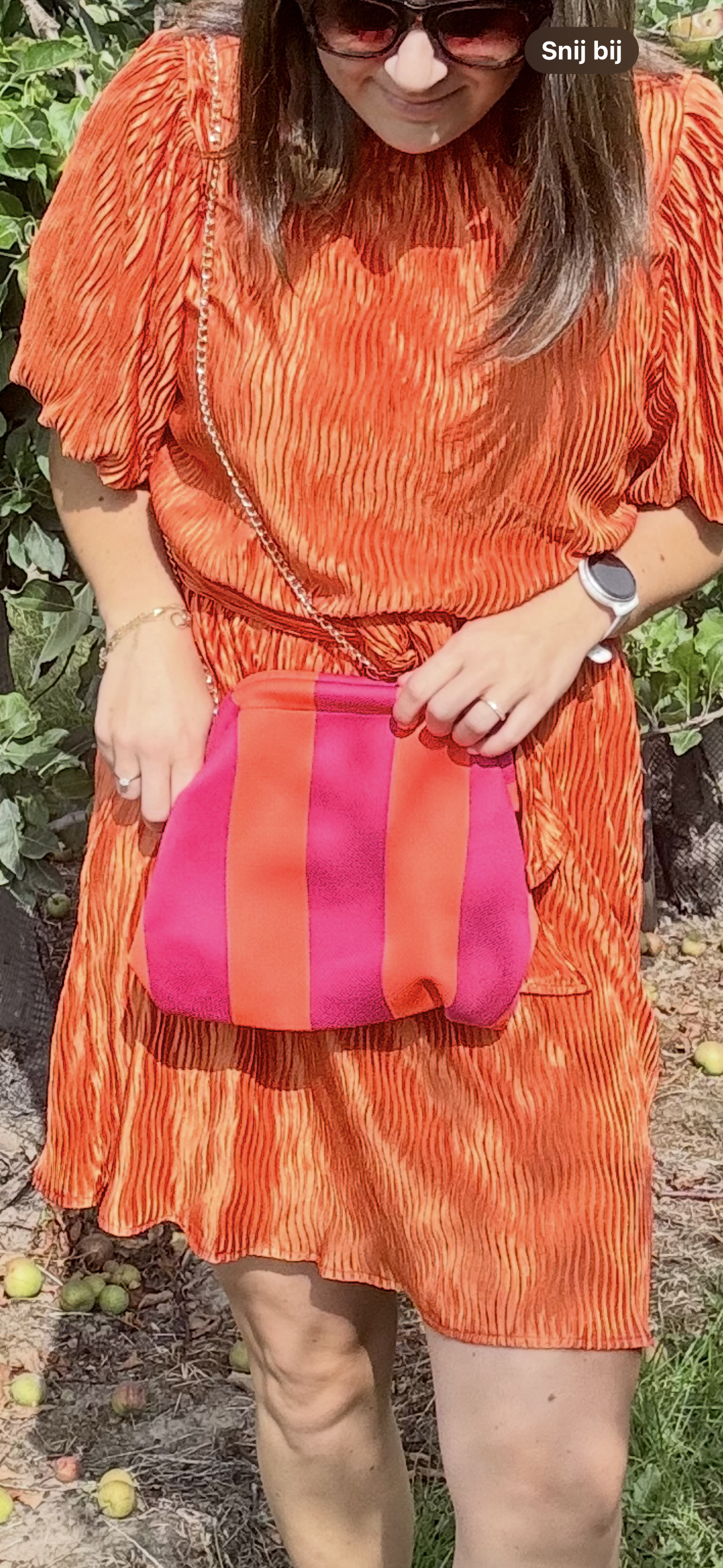 Gestreepte clutch oranje