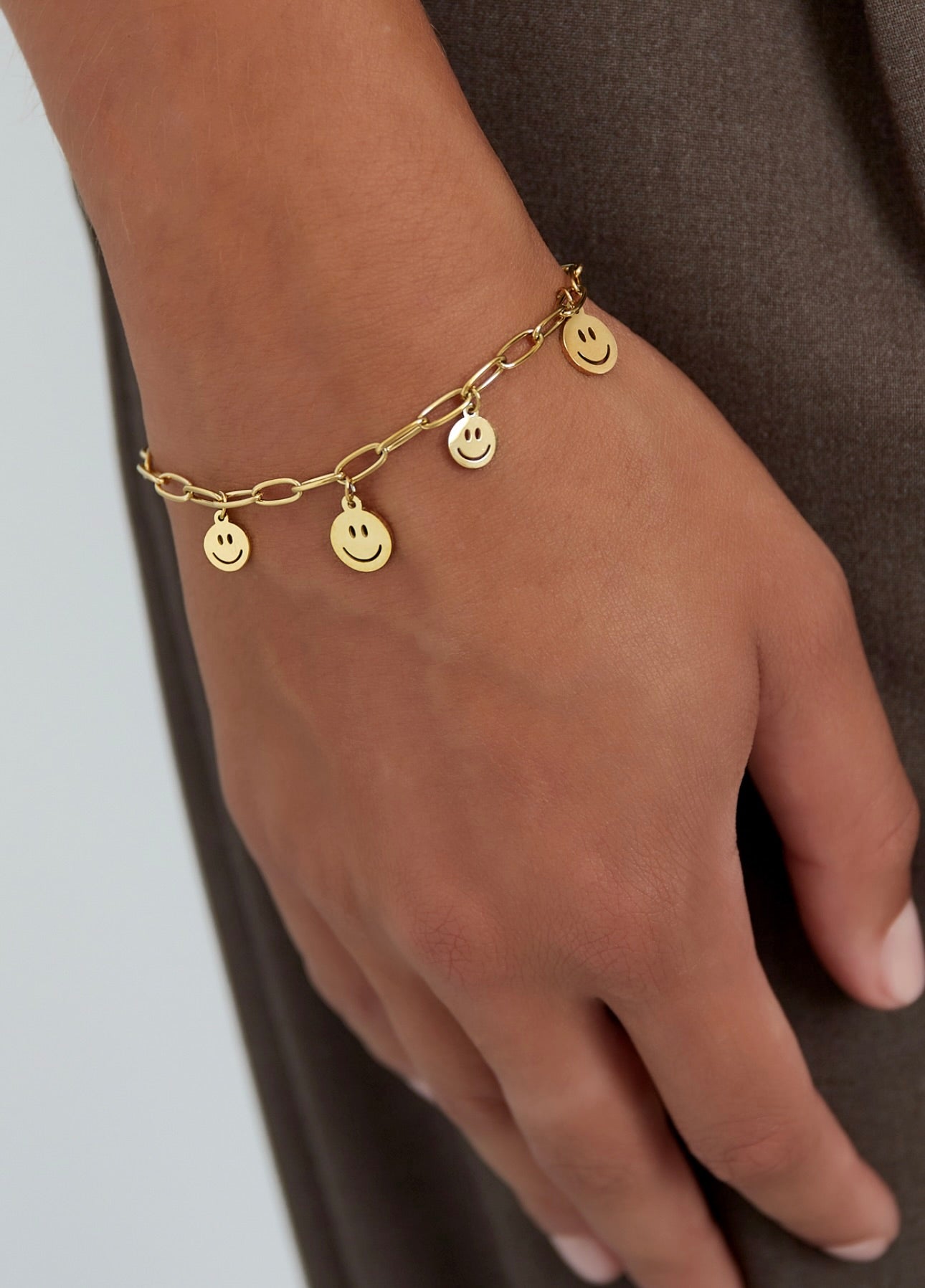 Smiley goudkleurige armband