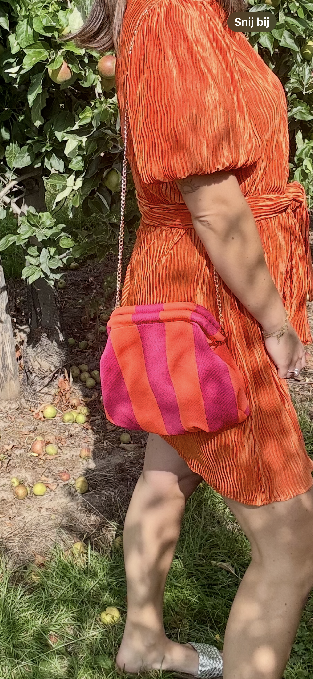 Gestreepte clutch oranje